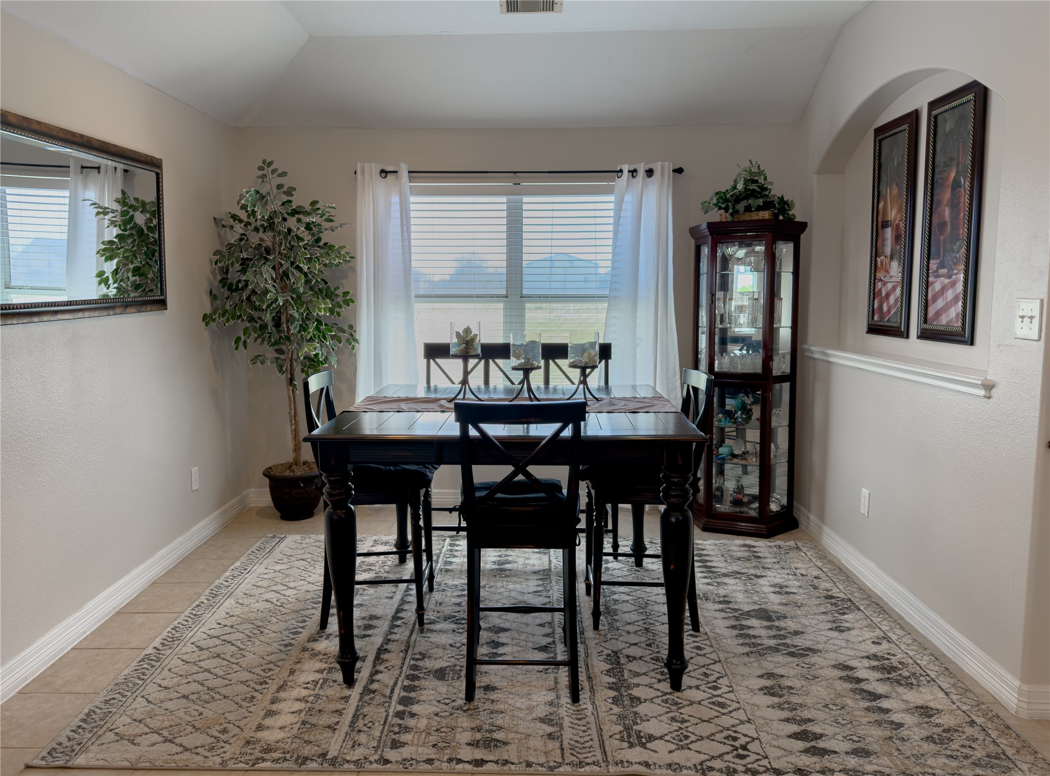 14302 Austin Bayou Drive Rosharon, TX 77583 - Photo 4 of 22 a view of a dining room with furniture and window