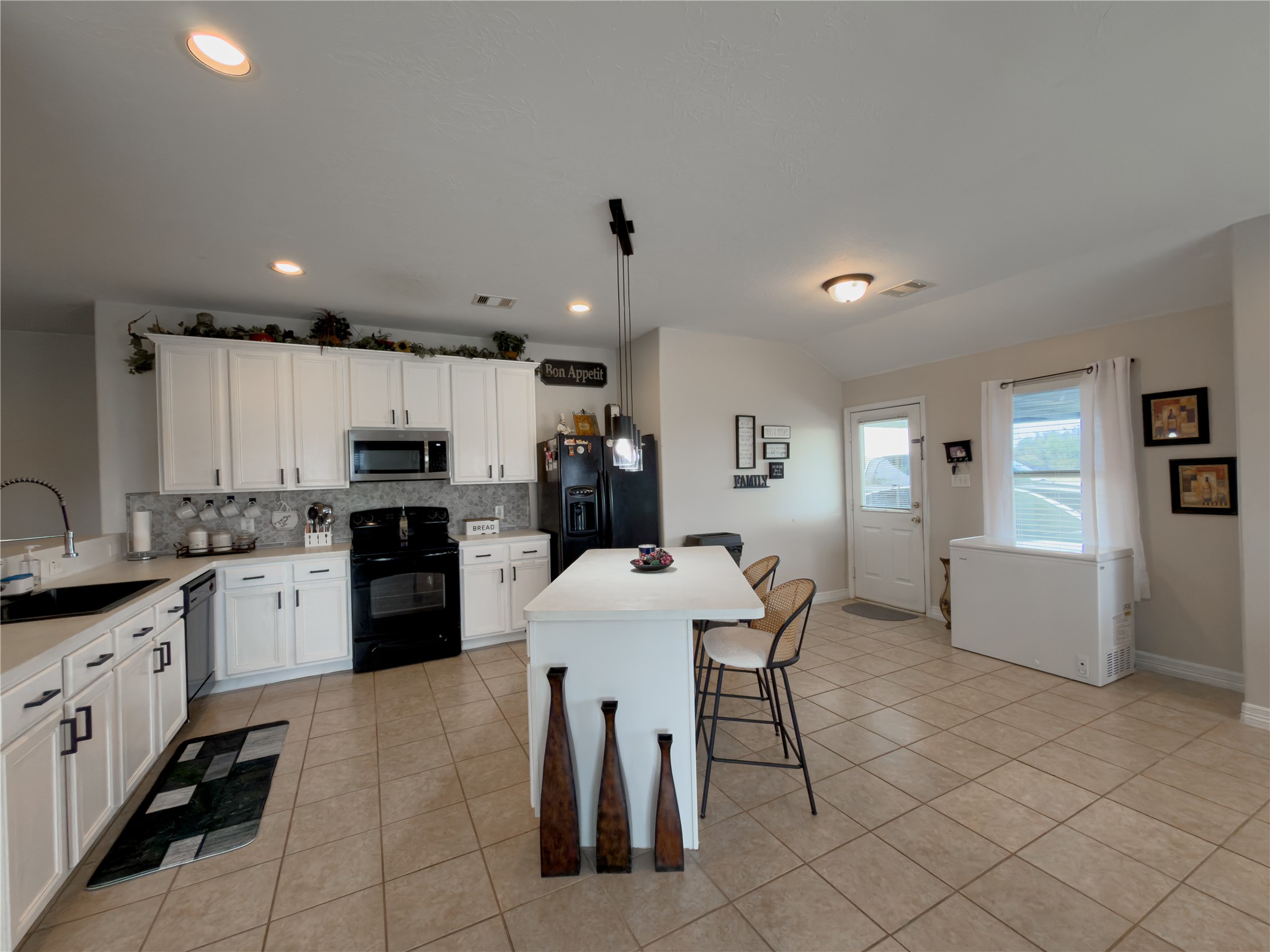 14302 Austin Bayou Drive Rosharon, TX 77583 - Photo 5 of 22 a kitchen with granite countertop a sink cabinets and stainless steel appliances