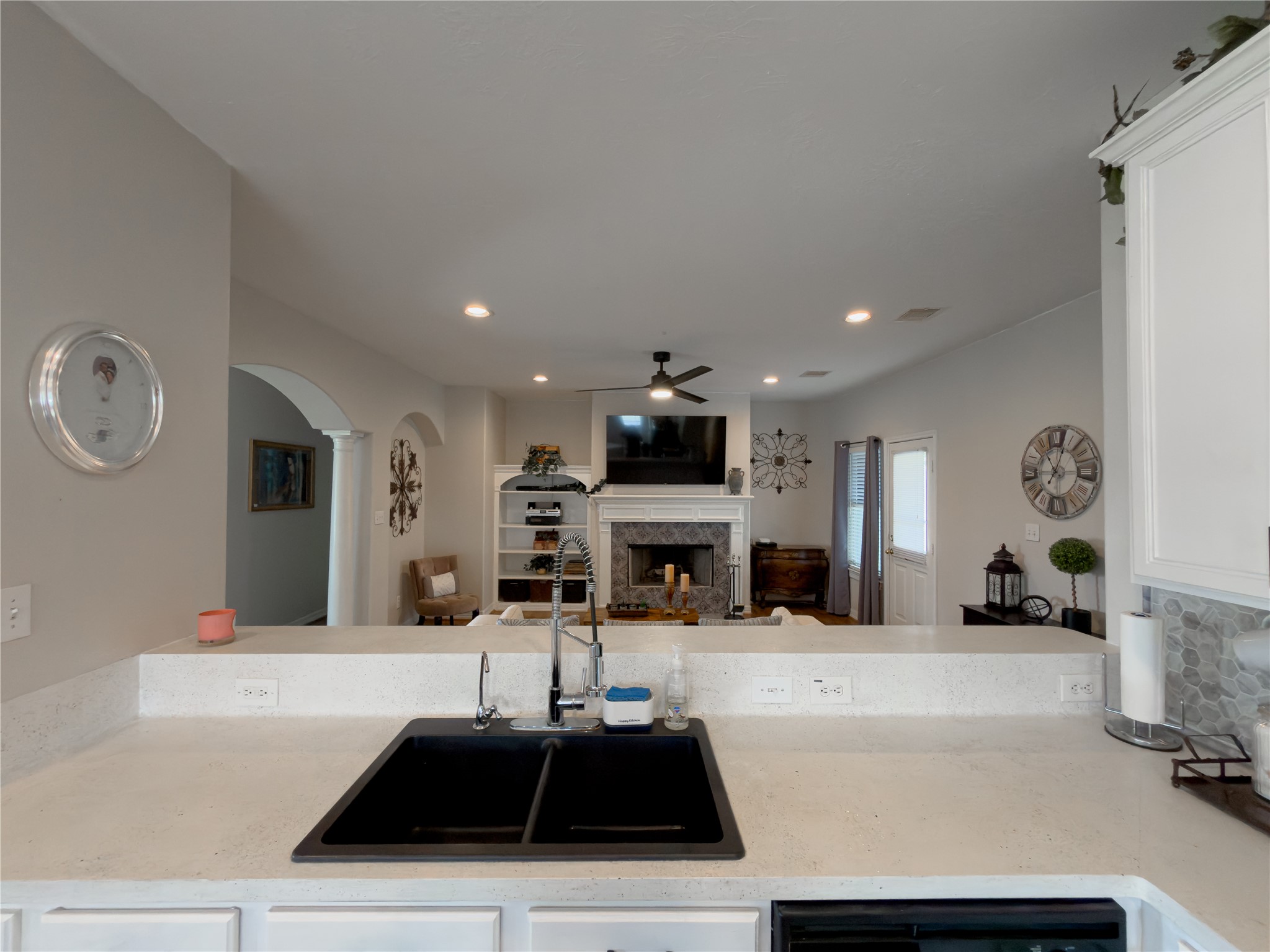14302 Austin Bayou Drive Rosharon, TX 77583 - Photo 7 of 22 a kitchen with stainless steel appliances a sink and a refrigerator