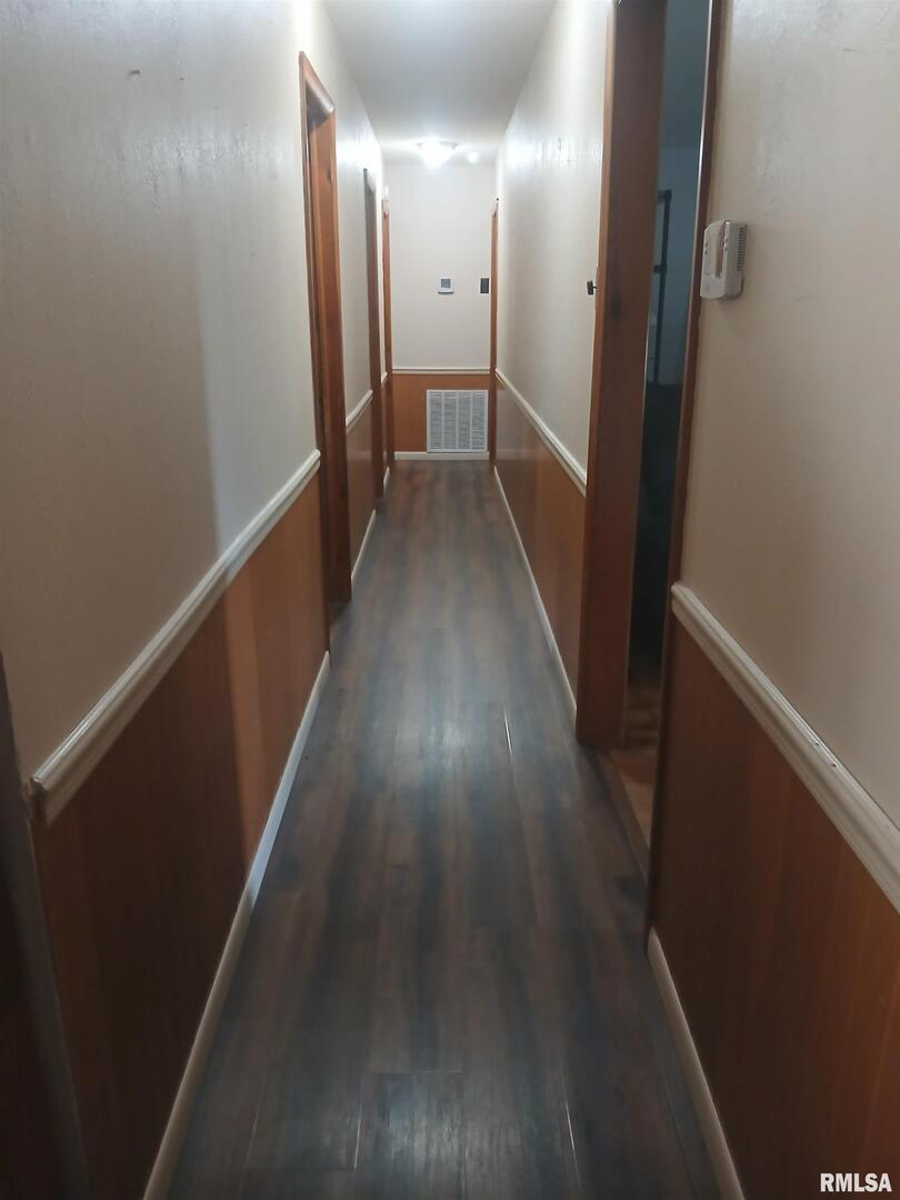 420 South 27th Street Herrin, IL 62948 - Photo 6 of 20 a view of hallway with wooden floor