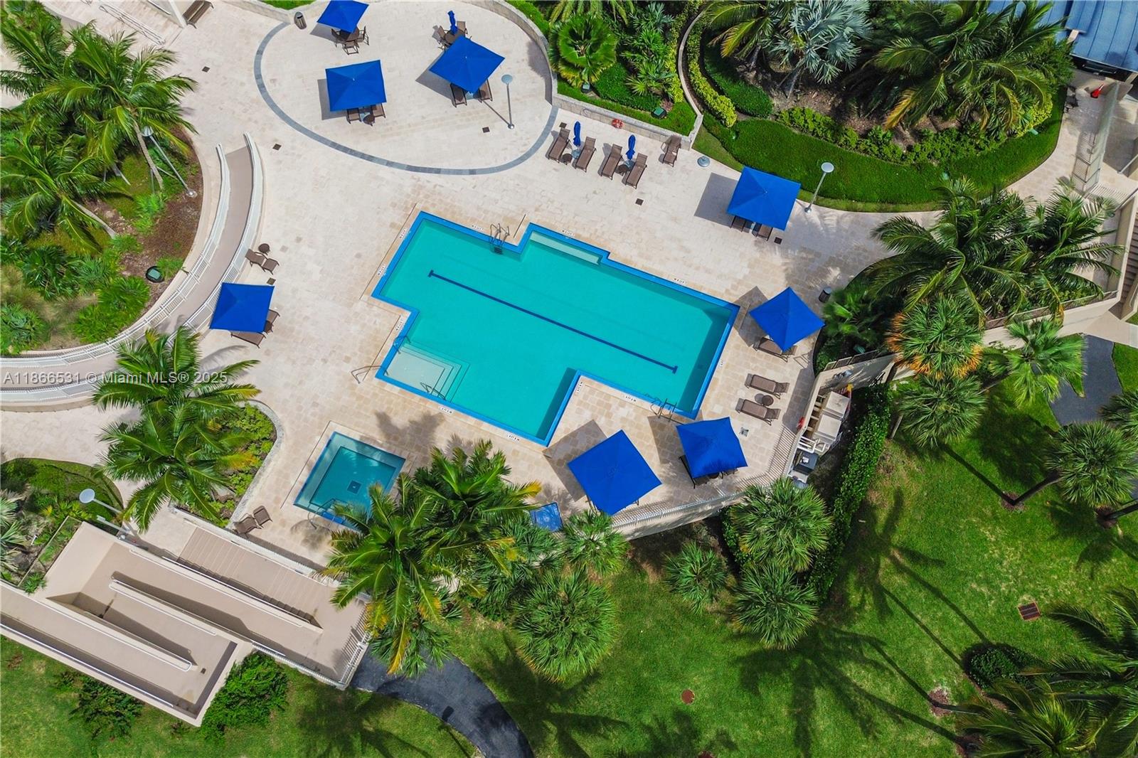 2 Grove Isle Drive, Unit B1603 Miami, FL 33133 - Photo 16 of 20 an aerial view of a house with a garden and swimming pool