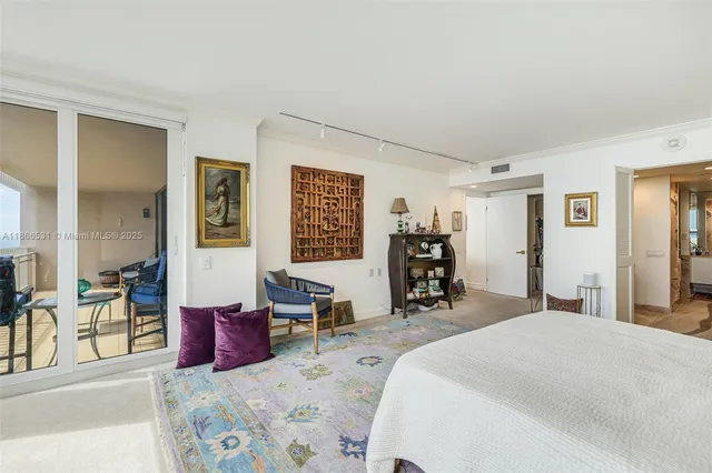 a bathroom with mirror and shower
