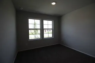 a view of a room with rack on the wall