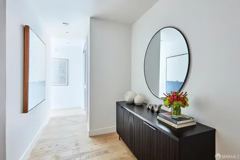 a white bath tub sitting in a tall building