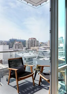 a view of a terrace with furniture