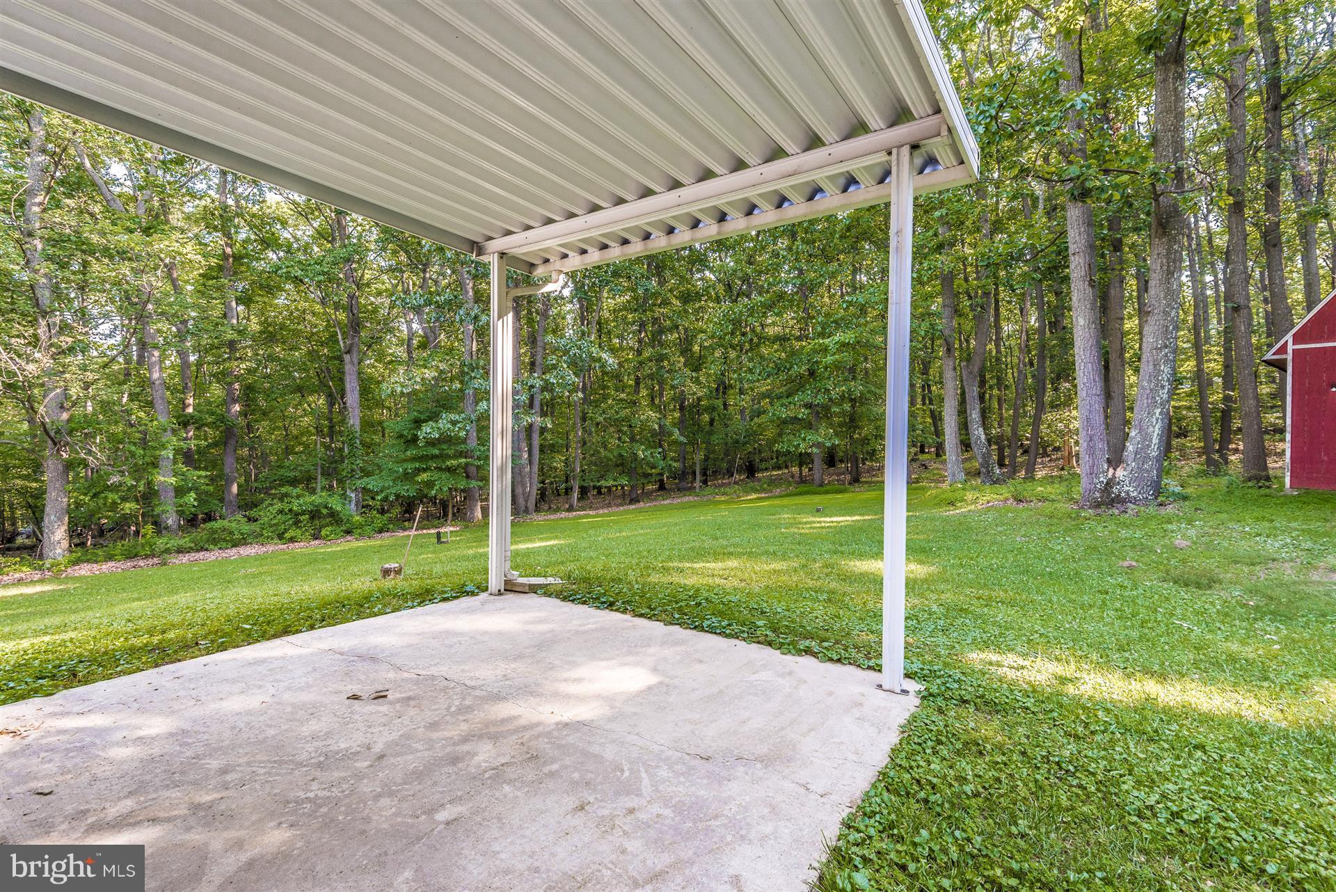14646 Peddicord Road Mount Airy, MD 21771 - Photo 28 of 30 Covered Patio off Family Rm overlooks Private yard