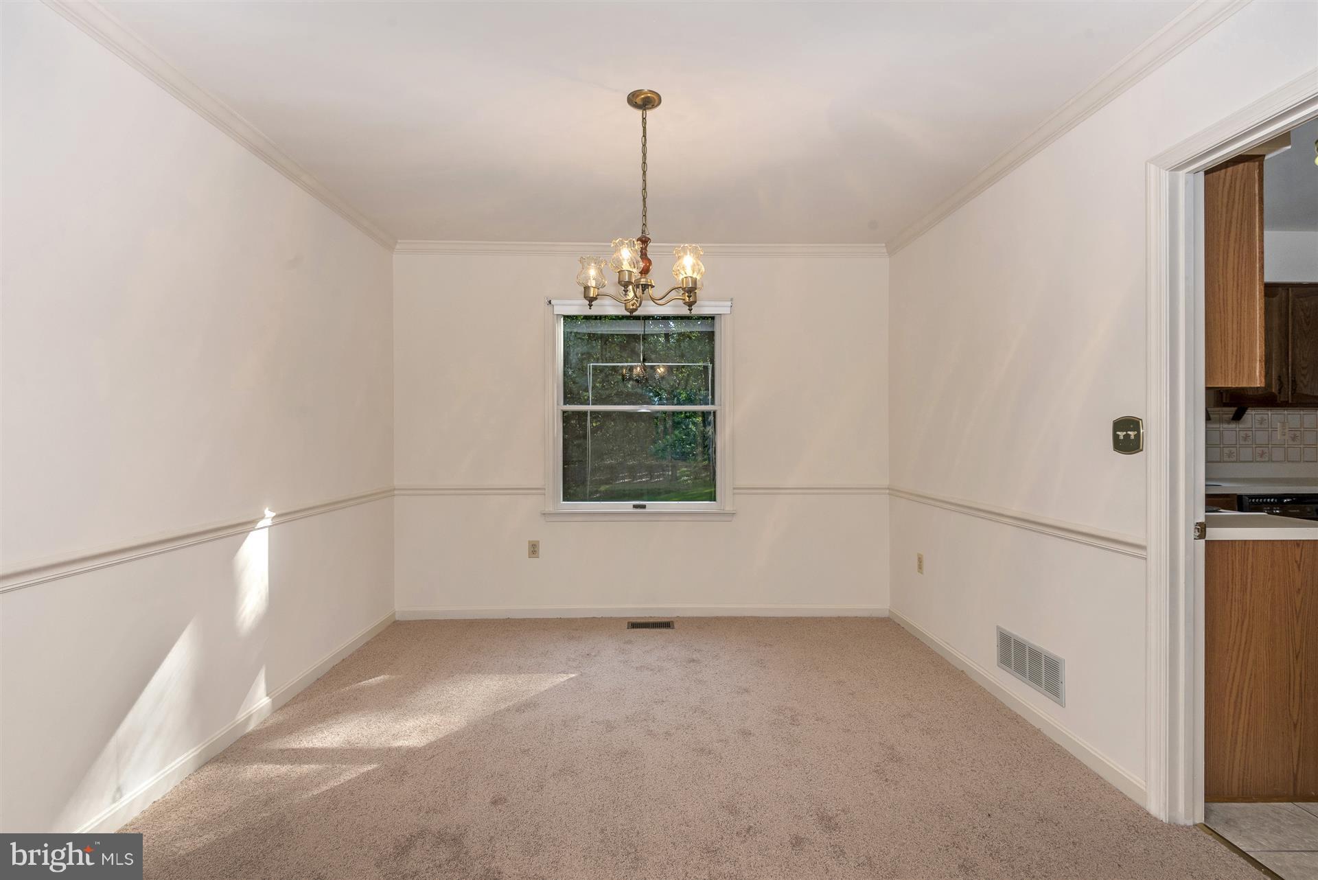 14646 Peddicord Road Mount Airy, MD 21771 - Photo 9 of 30 Dining Room has Crown& Chair Moldings