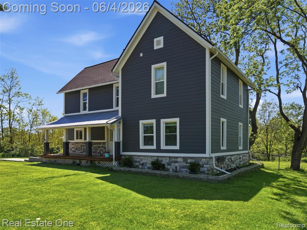879 North Hacker Road Howell, MI 48843 - Photo 1 of 54