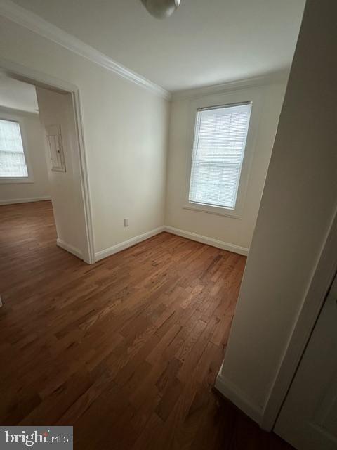 4005 4th Street Southeast, Unit 3 Washington, DC 20032 - Photo 9 of 10 an empty room with wooden floor and windows