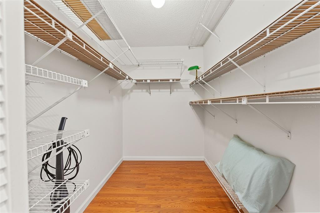 2233 Timber Lodge Lane Spring Hill, FL 34606 - Photo 26 of 59 a view of a room with racks on the wall