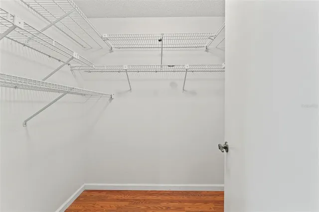 a view of parking garage with cars