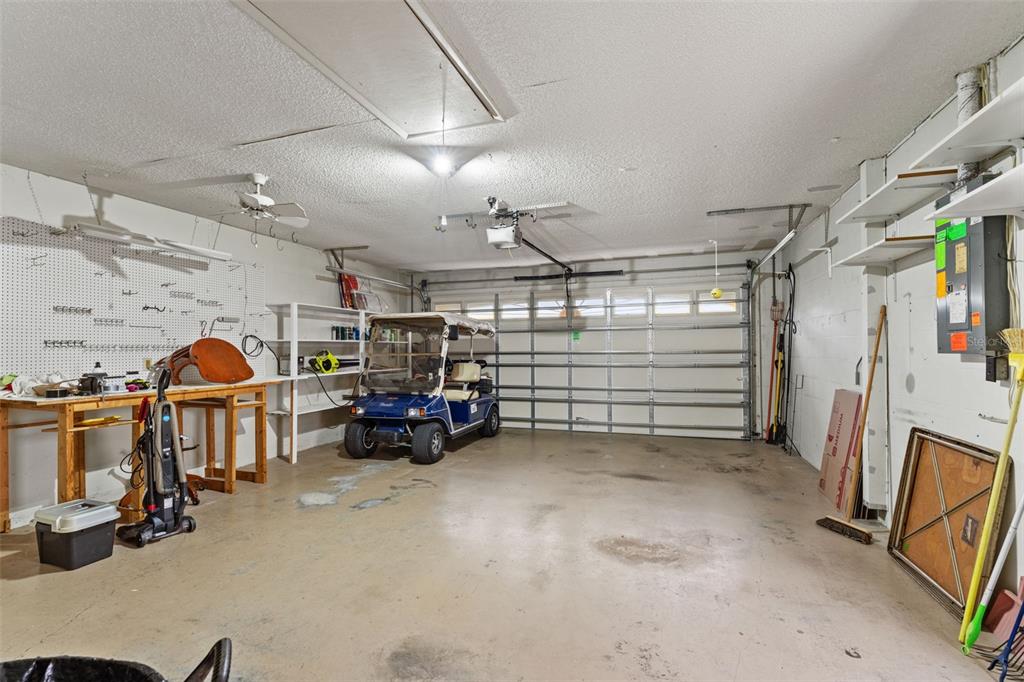2233 Timber Lodge Lane Spring Hill, FL 34606 - Photo 33 of 59 a view of parking garage with cars