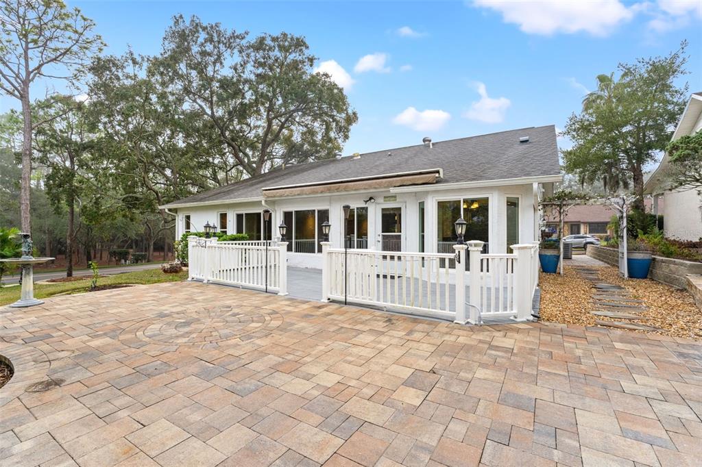 2233 Timber Lodge Lane Spring Hill, FL 34606 - Photo 41 of 59 a view of white house with a large window