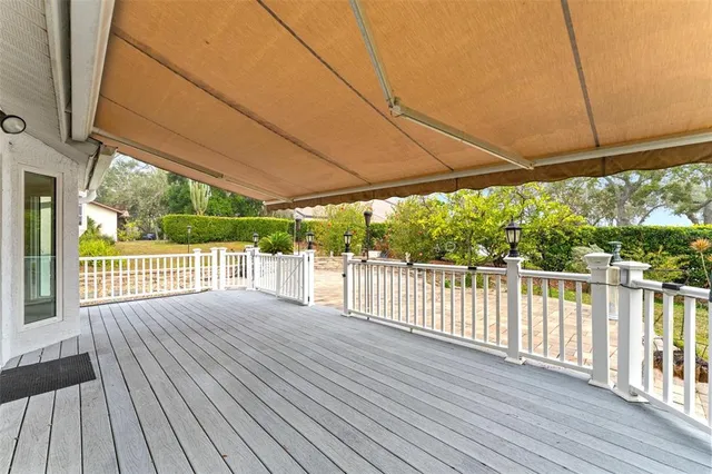 a view of a lake with a yard