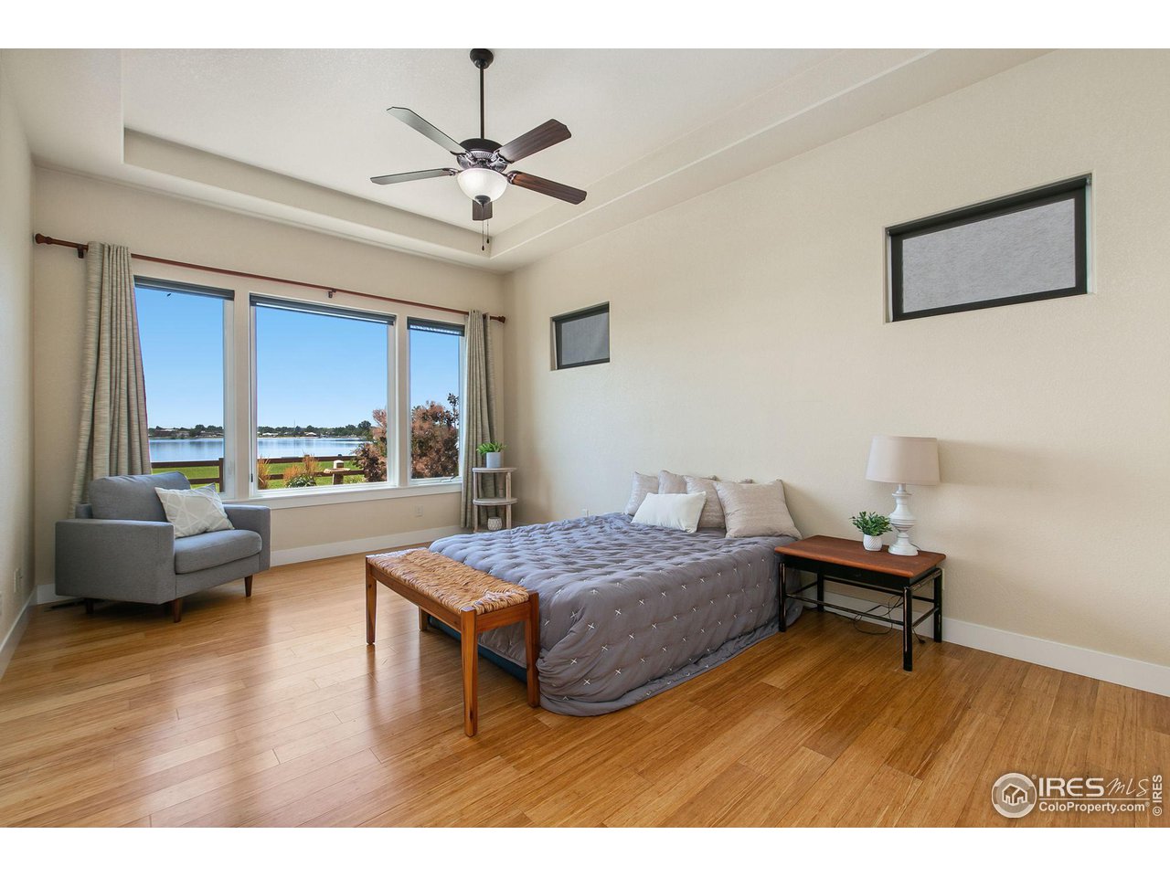 55 Veronica Drive Windsor, CO 80550 - Photo 12 of 24 Large primary bedroom with lake views