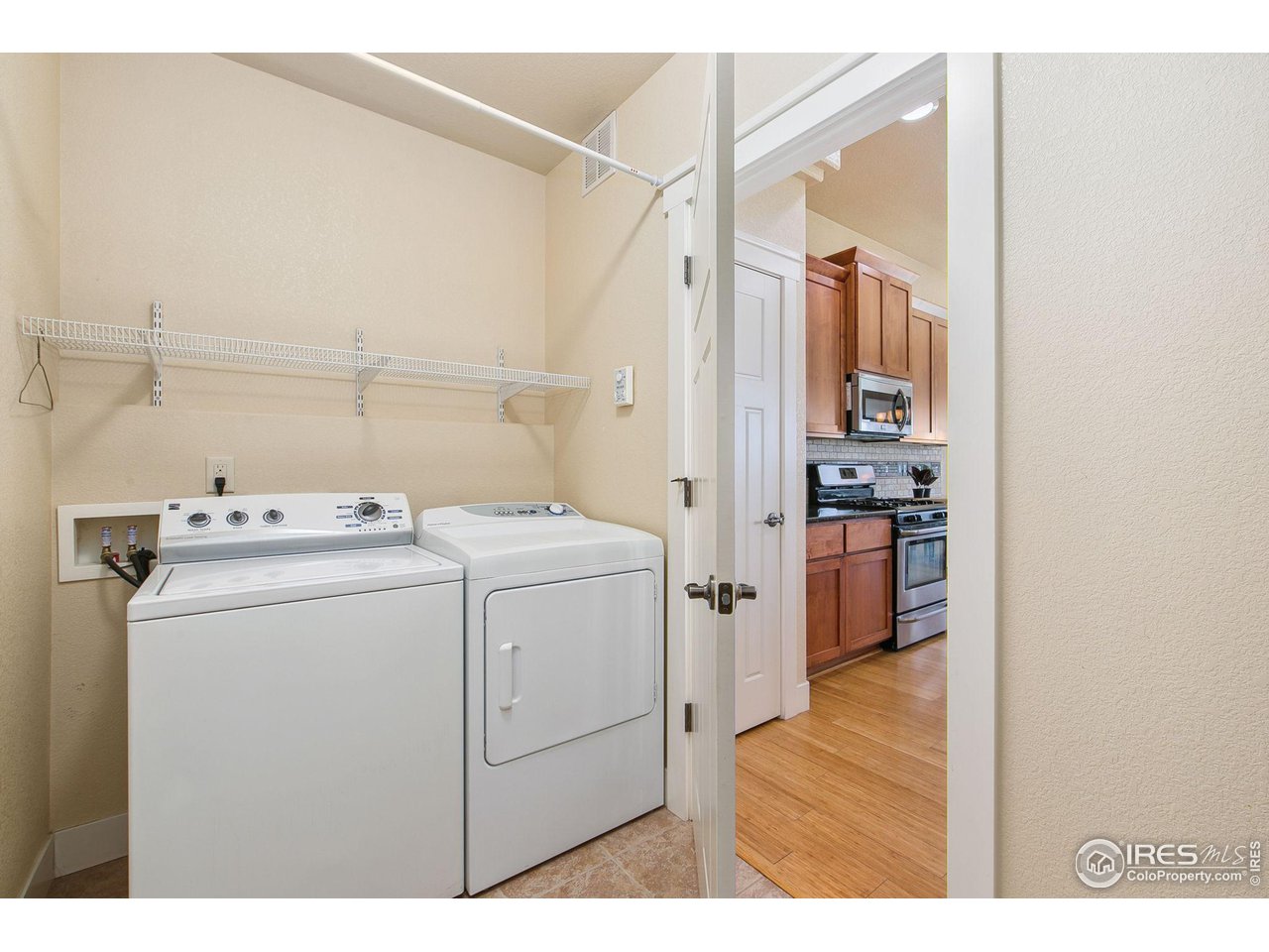 55 Veronica Drive Windsor, CO 80550 - Photo 16 of 24 Mud room and laundry off the garage for easy access.