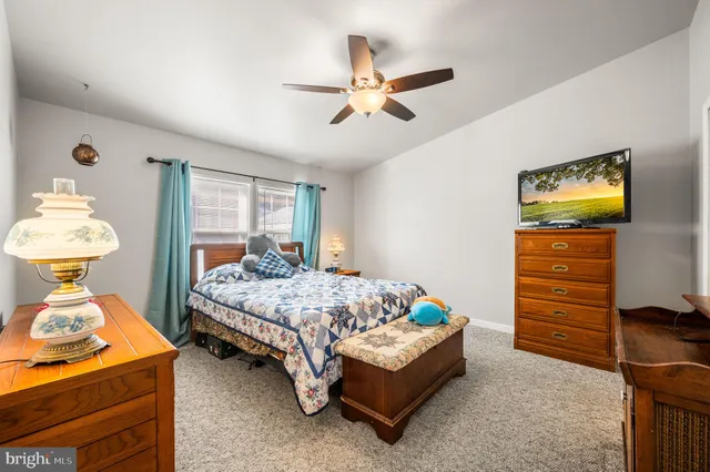 a bedroom with a bed and furniture