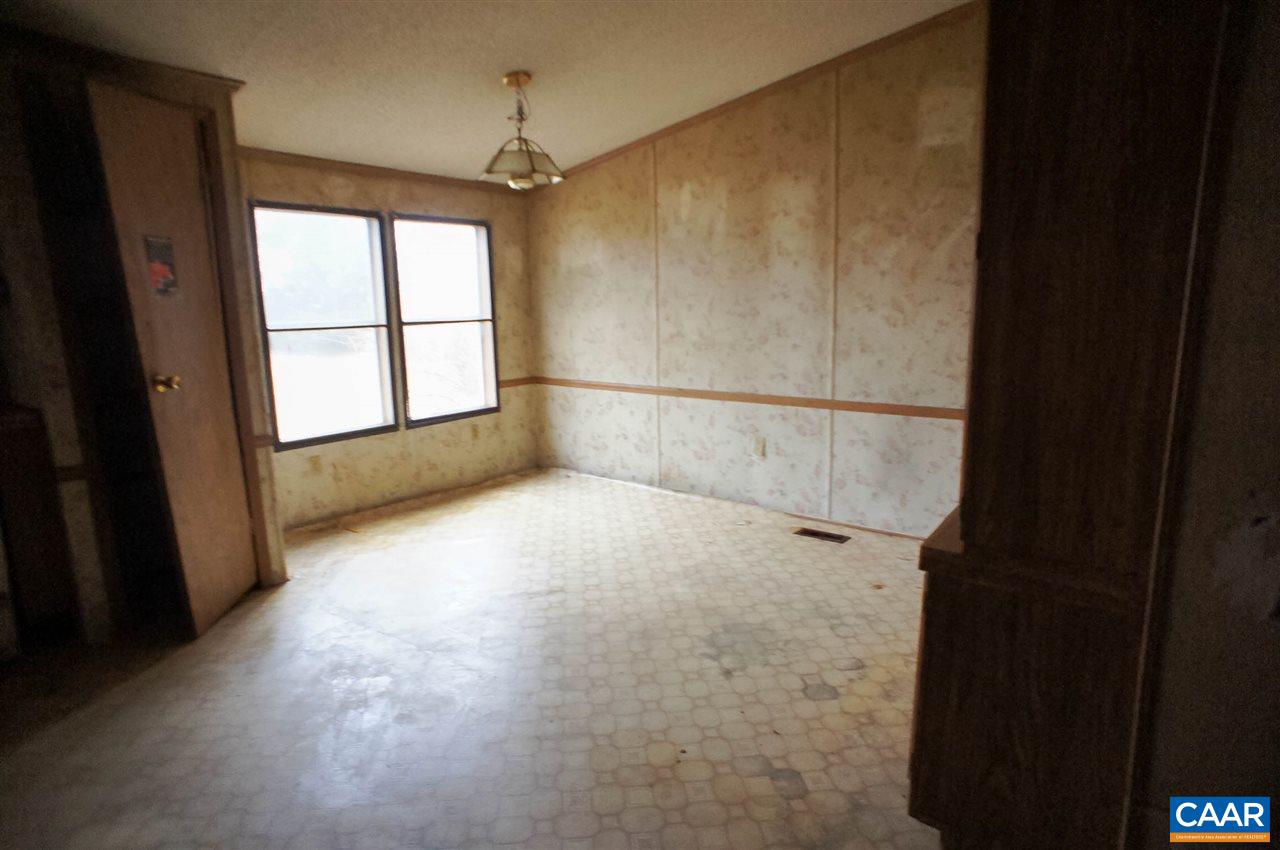 1363 Ridge Road Palmyra, VA 22963 - Photo 6 of 10 en empty room with windows and entrance