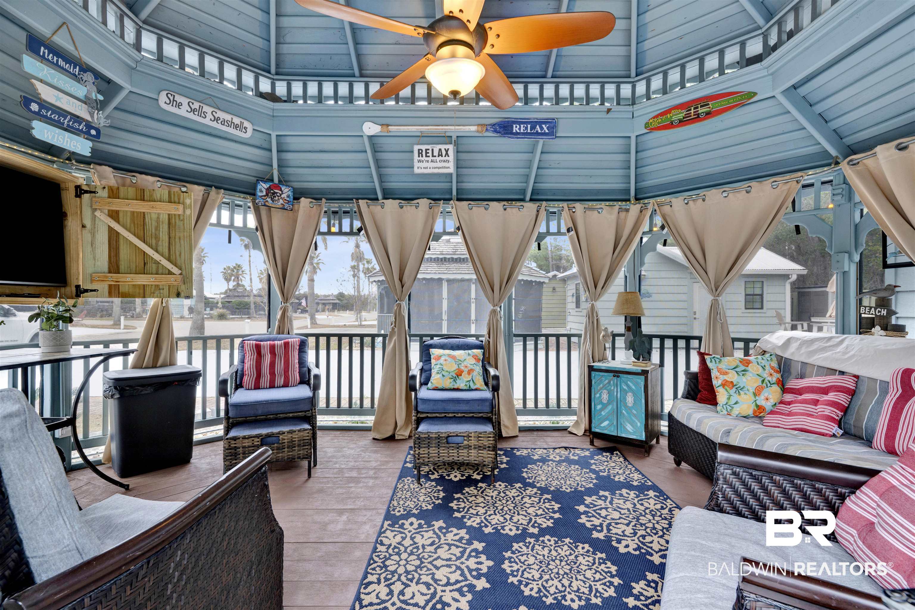 4650 Griffith Marina Road, Unit LOT 24 Orange Beach, AL 36561 - Photo 17 of 34 Sunroom with ceiling fan, an outdoor hangout area, and plenty of natural light
