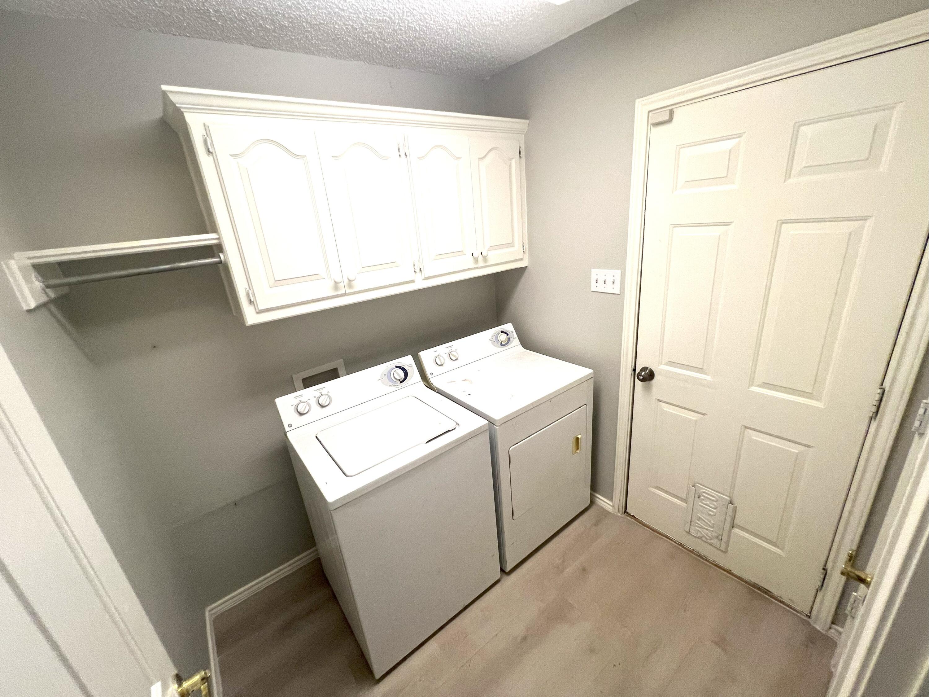 2314 Farm To Market 41 Lubbock, TX 79423 - Photo 14 of 18 a utility room with dryer and washer
