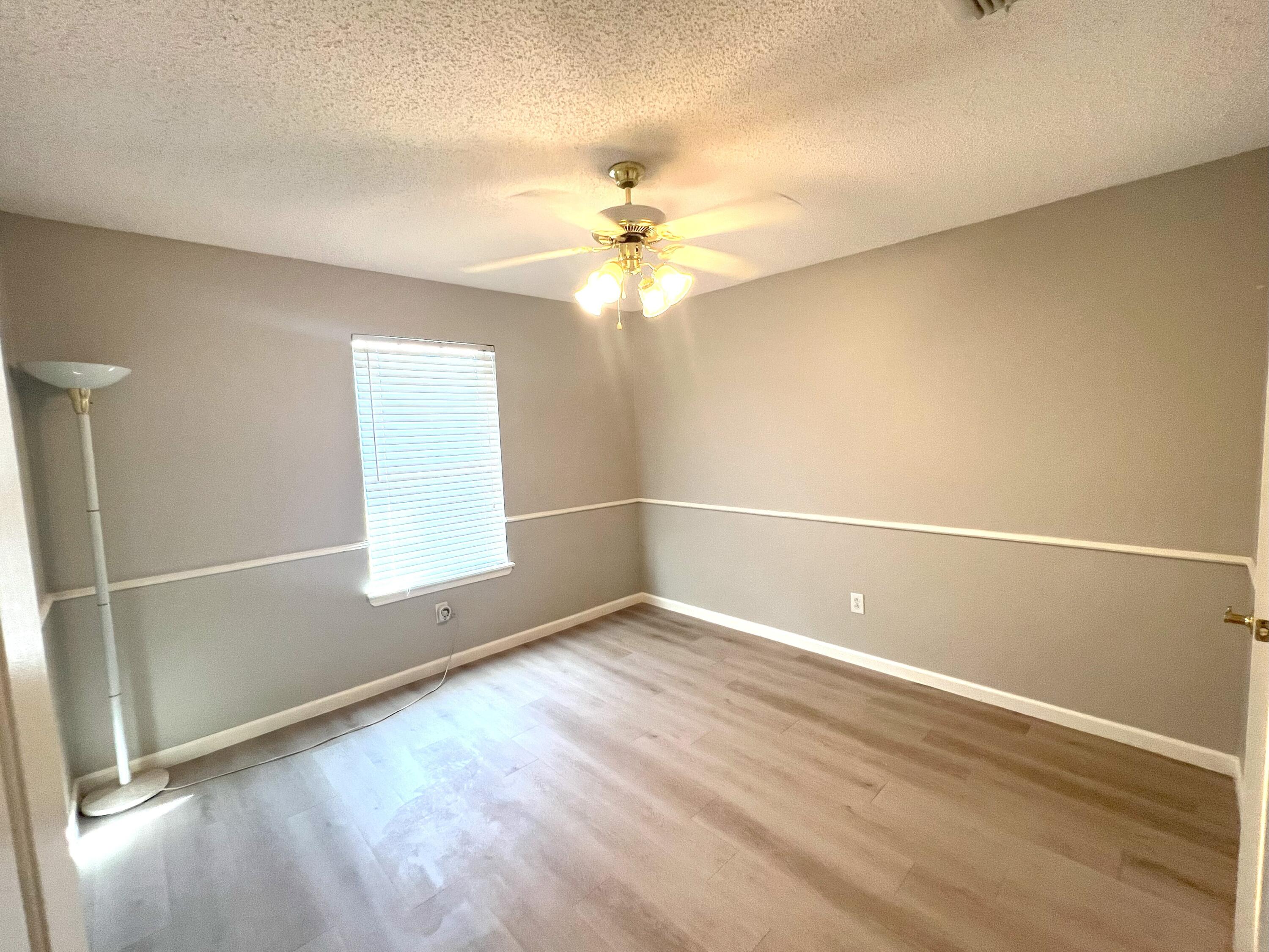 2314 Farm To Market 41 Lubbock, TX 79423 - Photo 3 of 18 an empty room with windows and fan