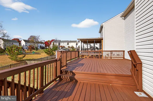 a view of balcony with wooden floor