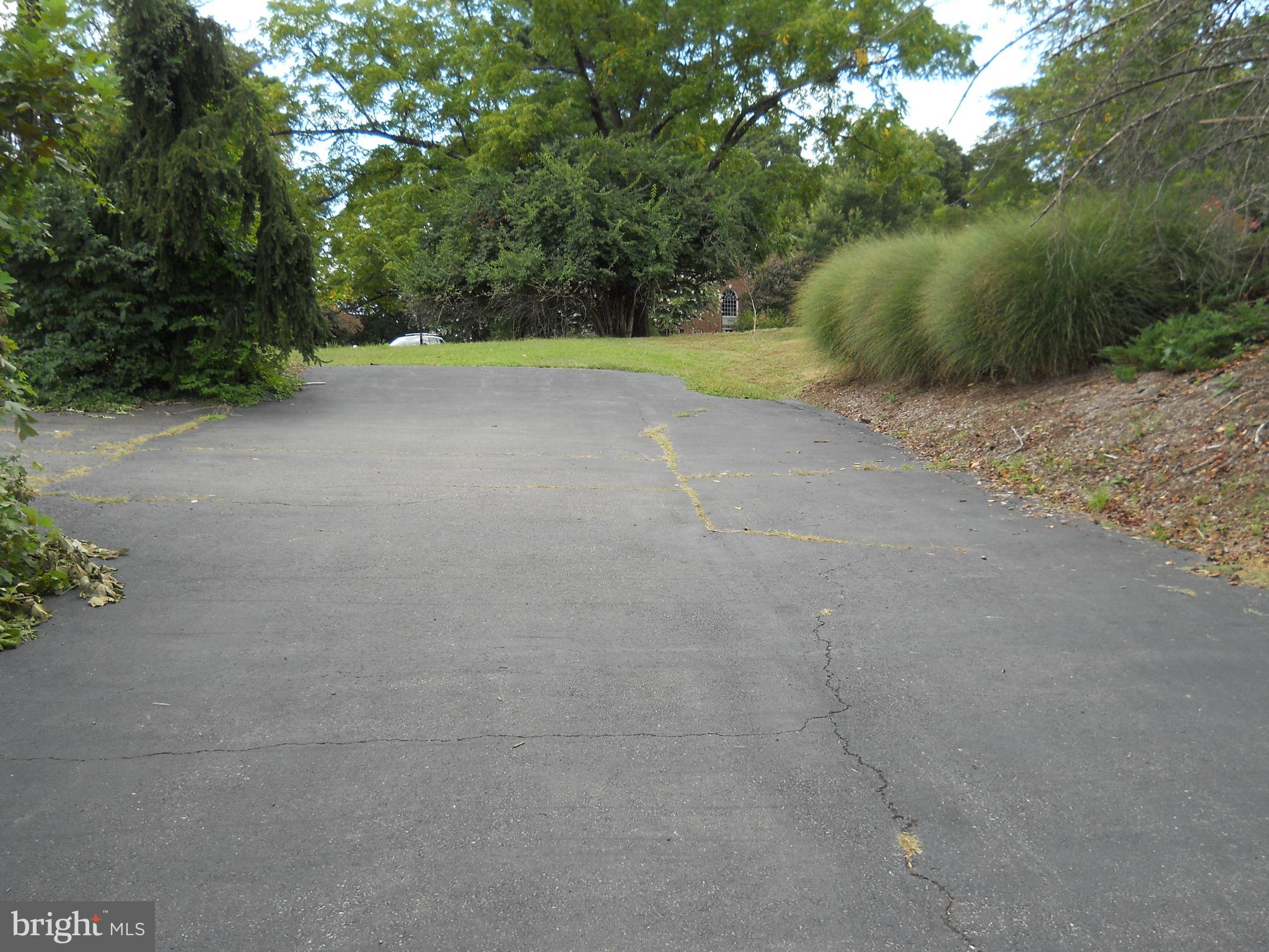 3424 Jermantown Road Fairfax, VA 22030 - Photo 11 of 19 a view of an outdoor space and a yard