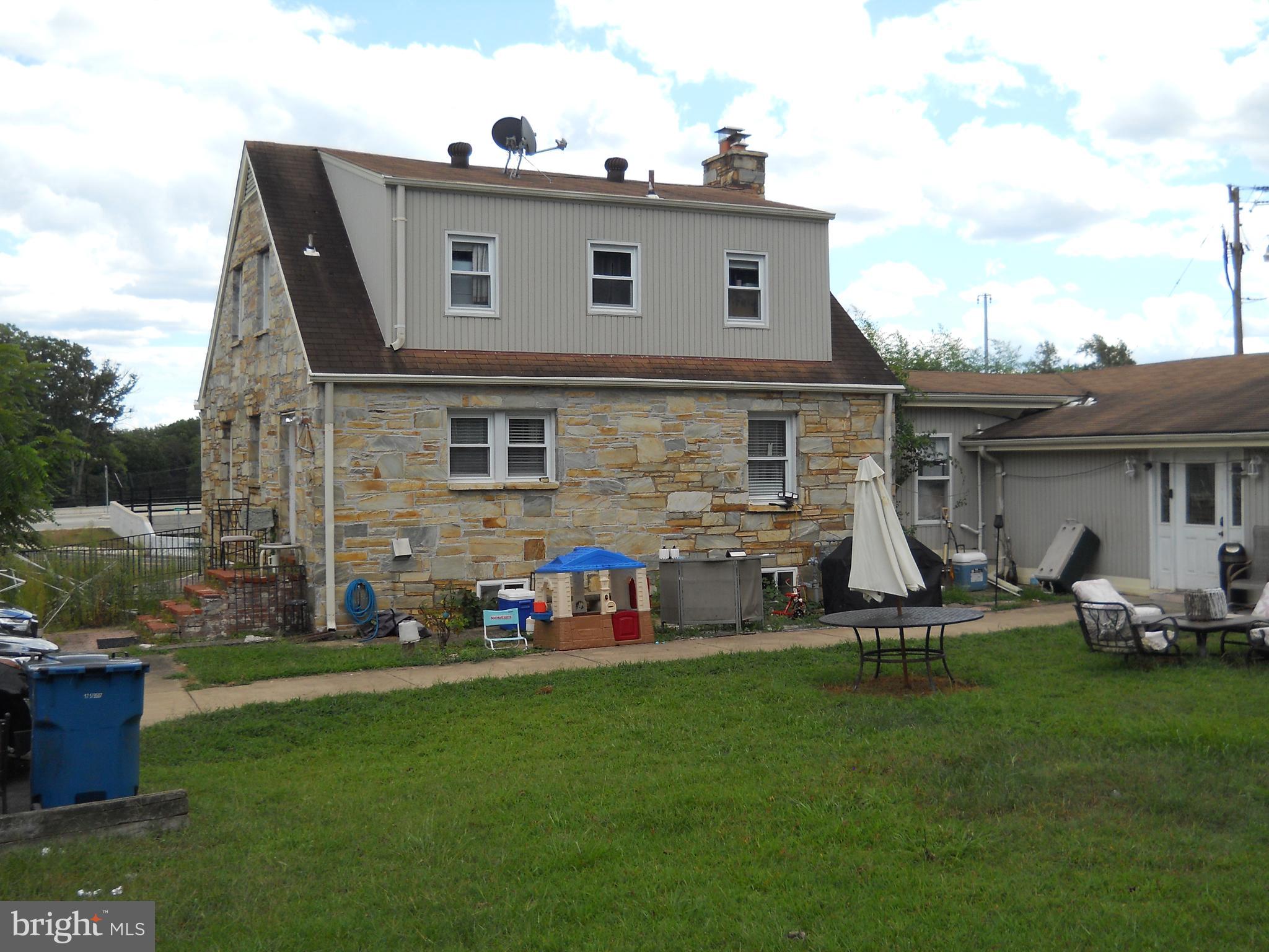 3424 Jermantown Road Fairfax, VA 22030 - Photo 15 of 19 a view of a house with a yard