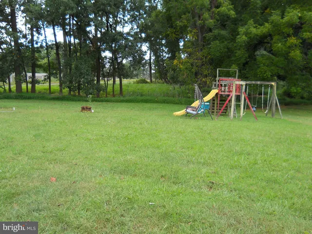 a view of a park with swings