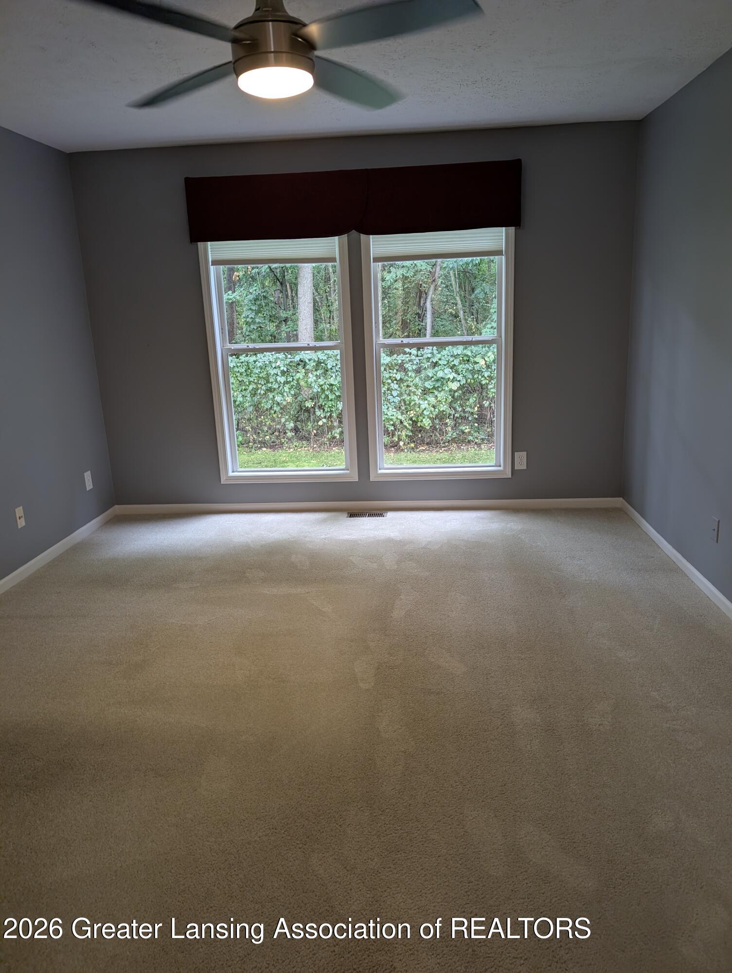 2415 North Aurelius Road, Unit 14 Holt, MI 48842 - Photo 7 of 29 Primary bedroom