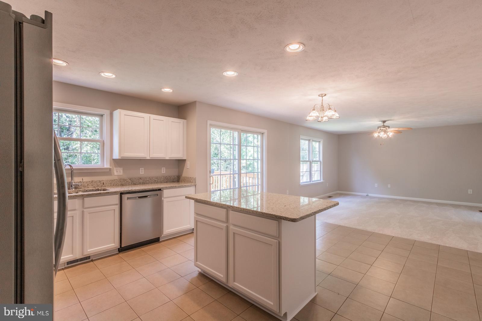 9107 Mullen Road King George, VA 22485 - Photo 14 of 40 Kitchen Island/Living Room View