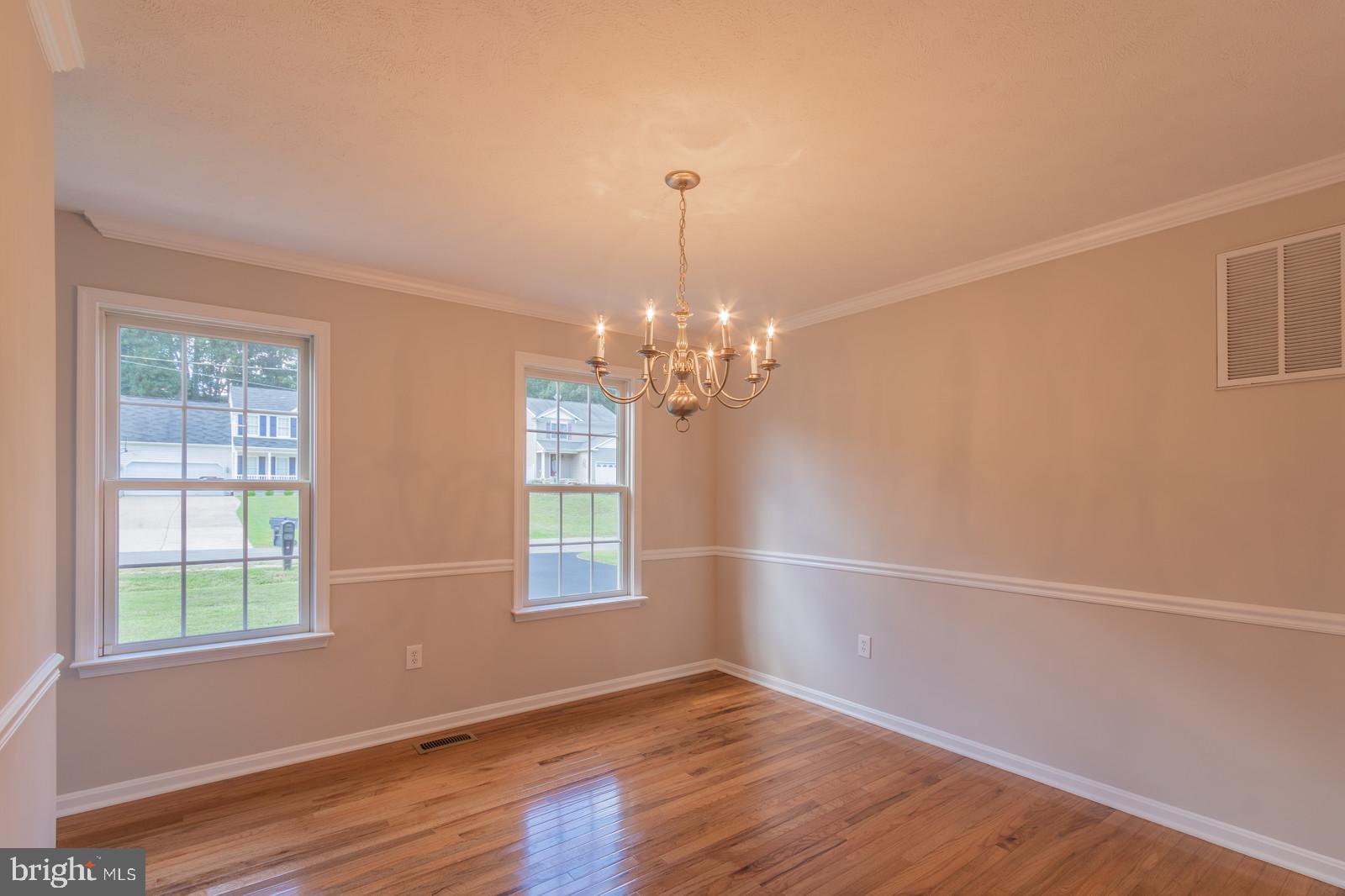 9107 Mullen Road King George, VA 22485 - Photo 5 of 40 Formal Dining Room with Hardwood Floors