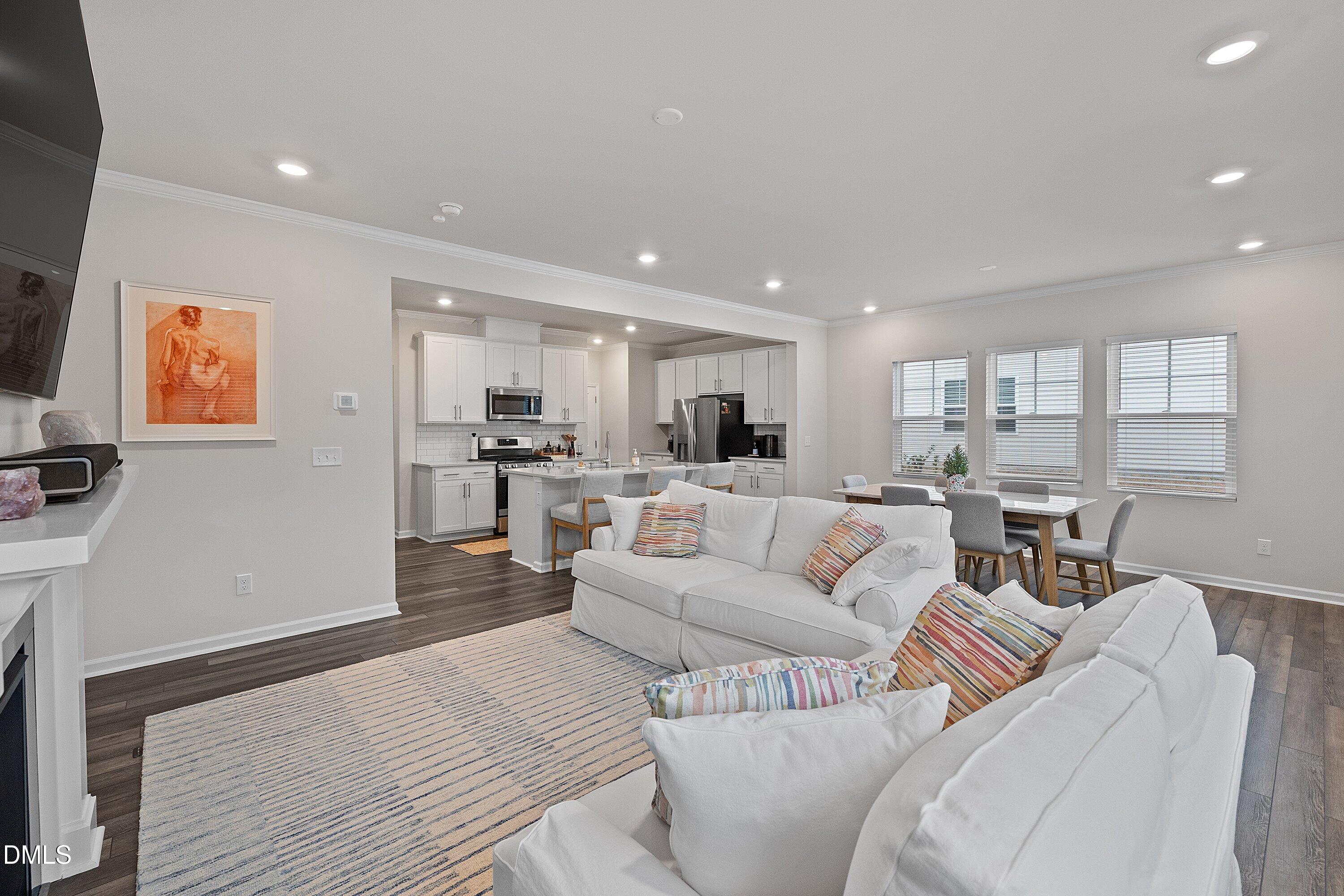 4028 Mount Moran Road Raleigh, NC 27616 - Photo 20 of 46 a living room with furniture and kitchen view