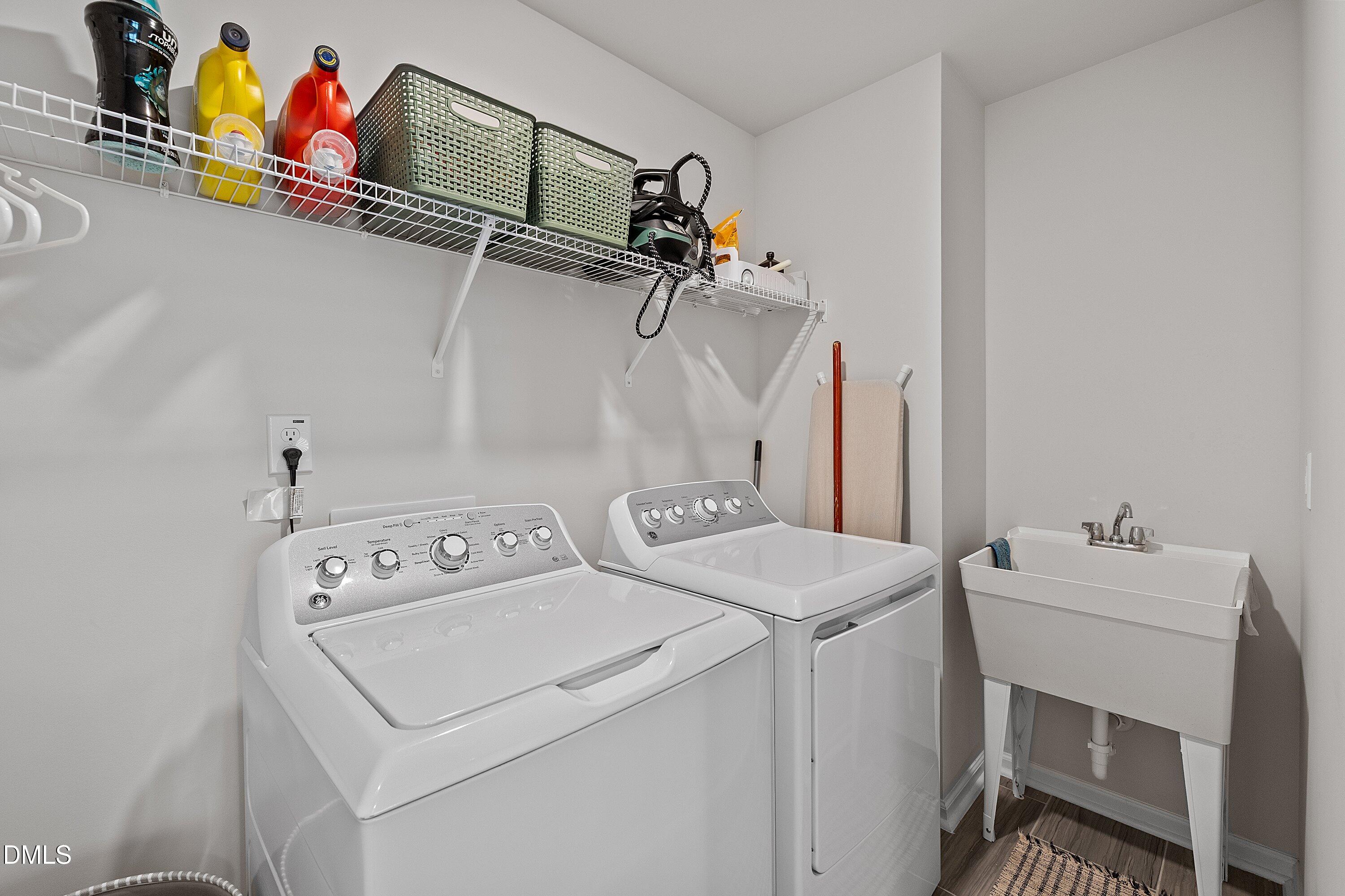 4028 Mount Moran Road Raleigh, NC 27616 - Photo 35 of 46 a utility room with dryer and washer