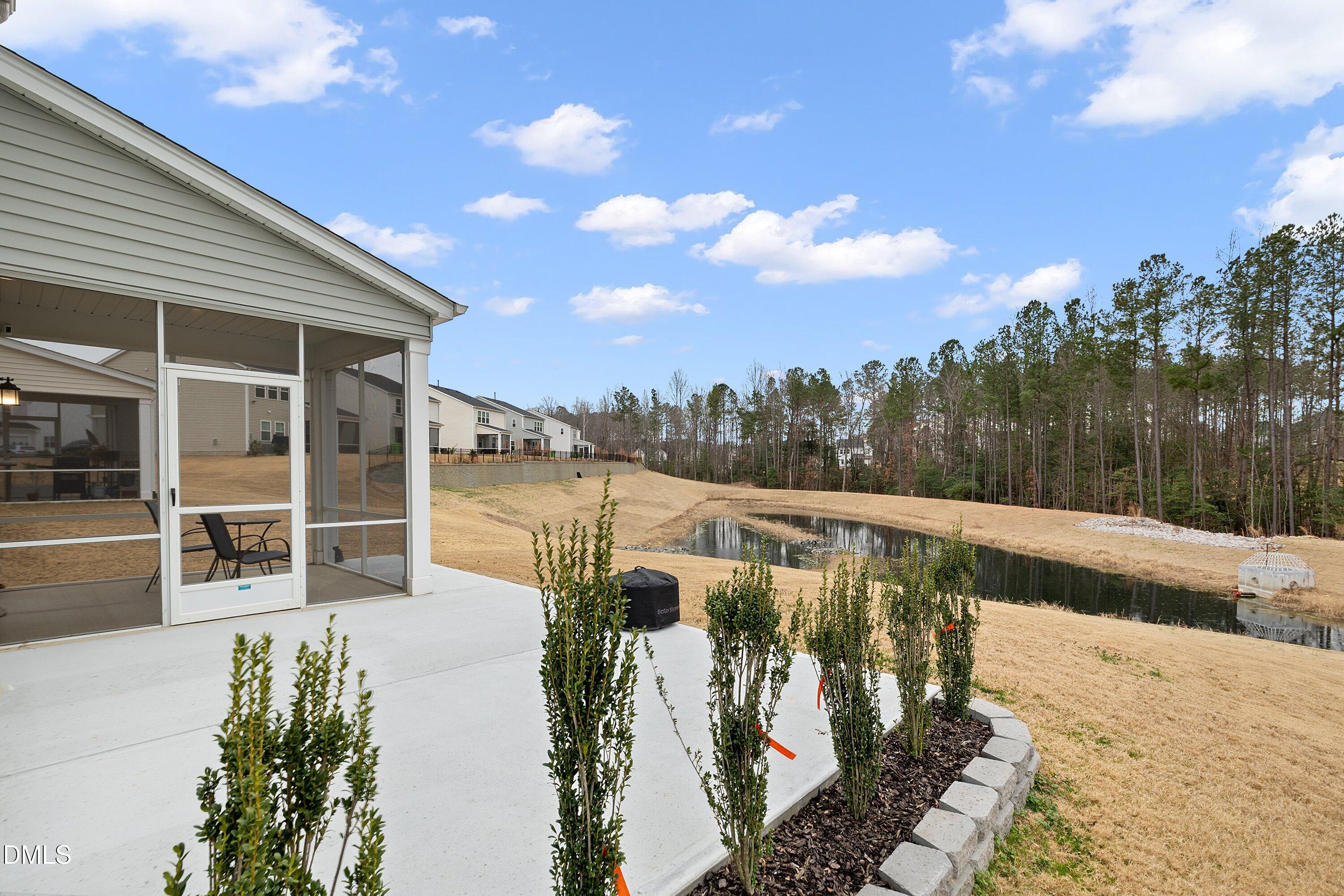 4028 Mount Moran Road Raleigh, NC 27616 - Photo 37 of 46 a view of a swimming pool with a patio