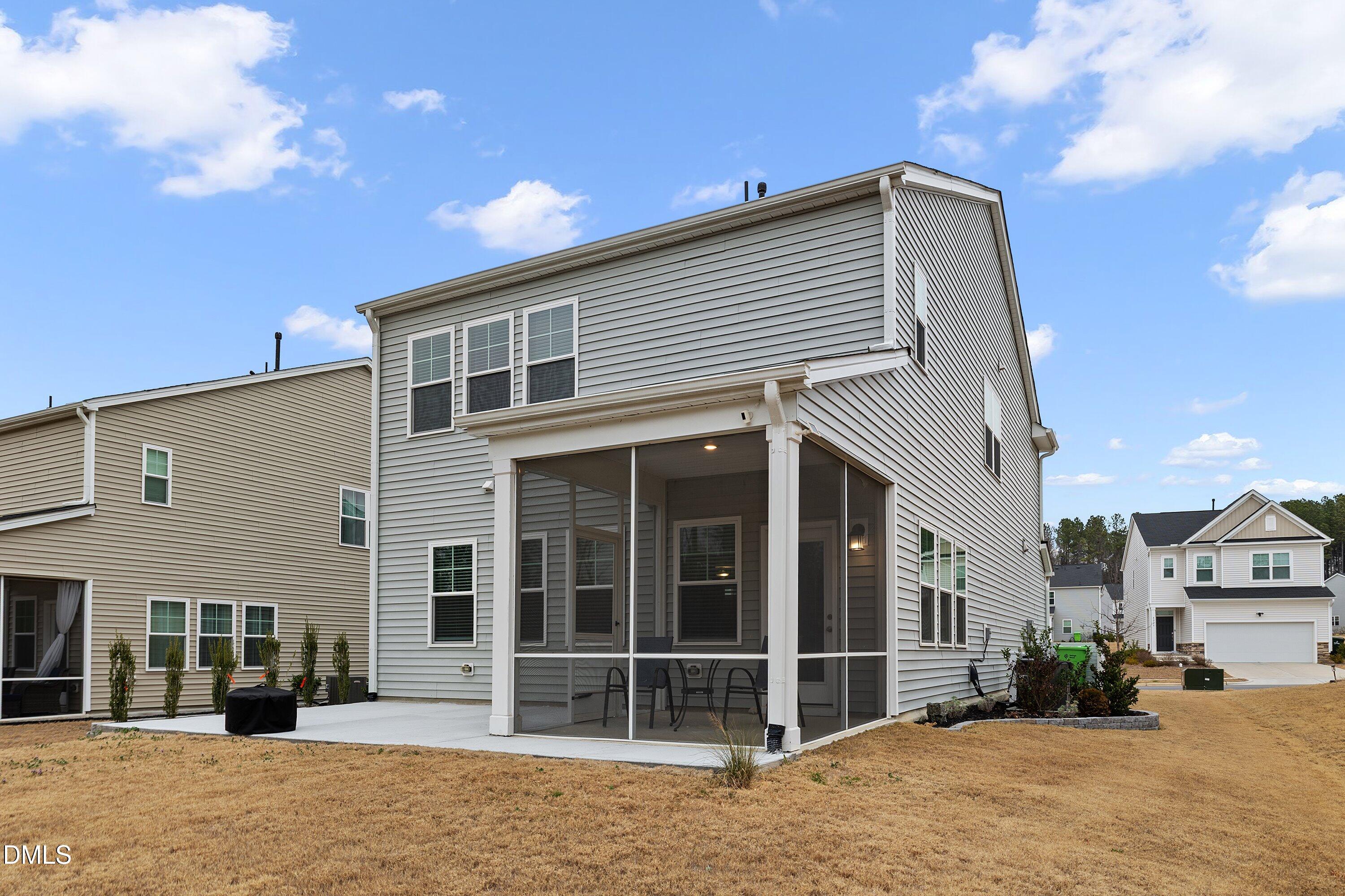 4028 Mount Moran Road Raleigh, NC 27616 - Photo 40 of 46 a front view of a house with a yard