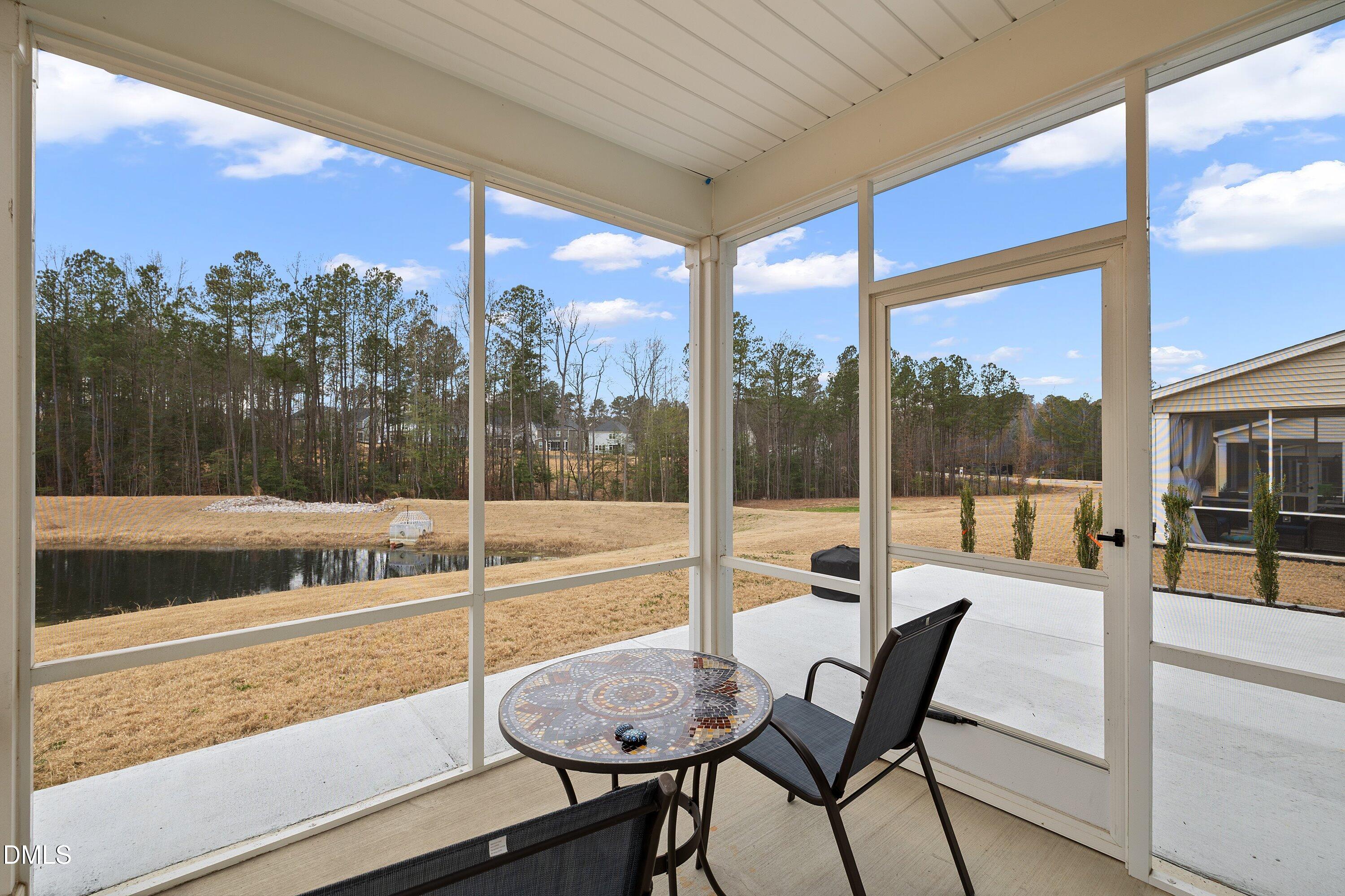 4028 Mount Moran Road Raleigh, NC 27616 - Photo 43 of 46 a view of a porch with furniture and a yard
