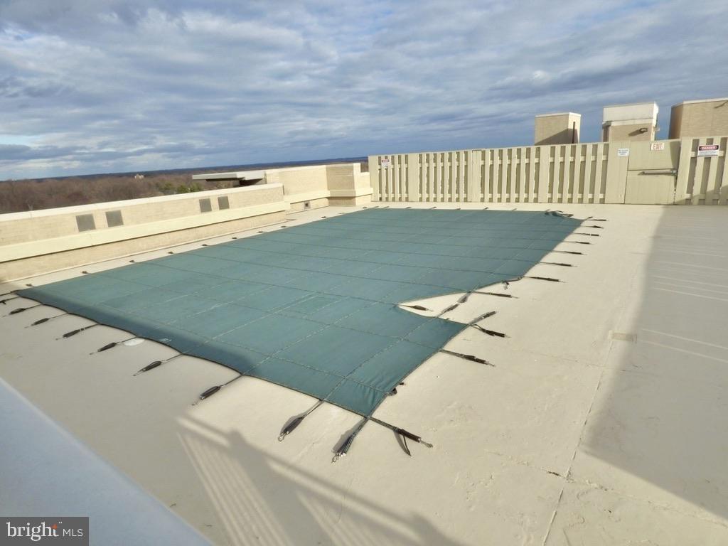 11800 Sunset Hills Road, Unit 118 Reston, VA 20190 - Photo 48 of 52 Serene rooftop retreat awaits summer.
