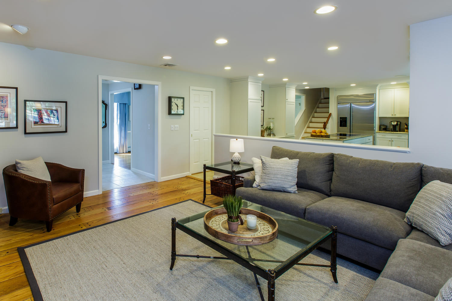 73 Talmadge Hill Road New Canaan, CT 06840 - Photo 11 of 37 a living room with furniture and a wooden floor
