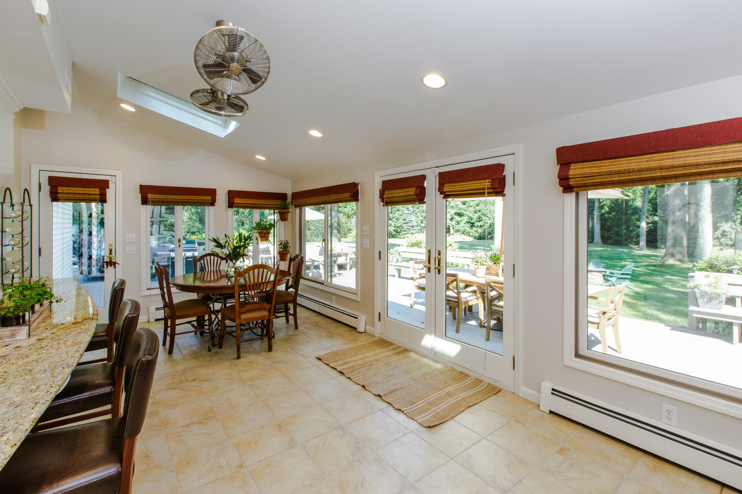 73 Talmadge Hill Road New Canaan, CT 06840 - Photo 12 of 37 a view of a dining room with furniture window and outside view