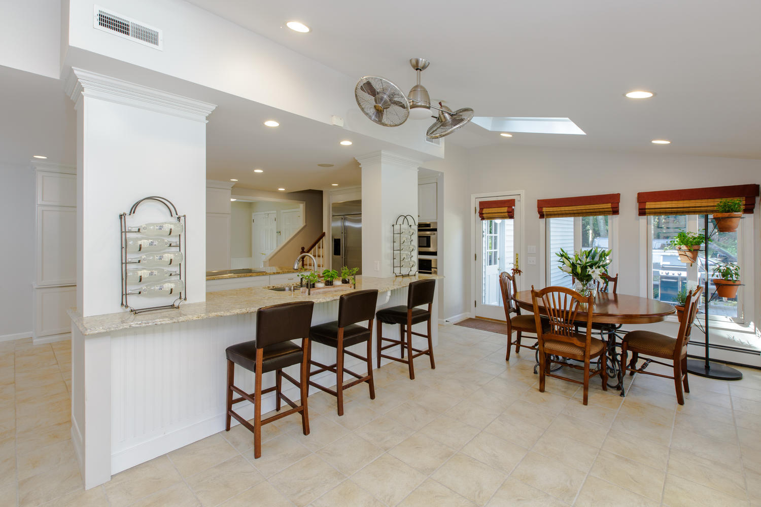73 Talmadge Hill Road New Canaan, CT 06840 - Photo 13 of 37 a view of a dining room with furniture and a large window
