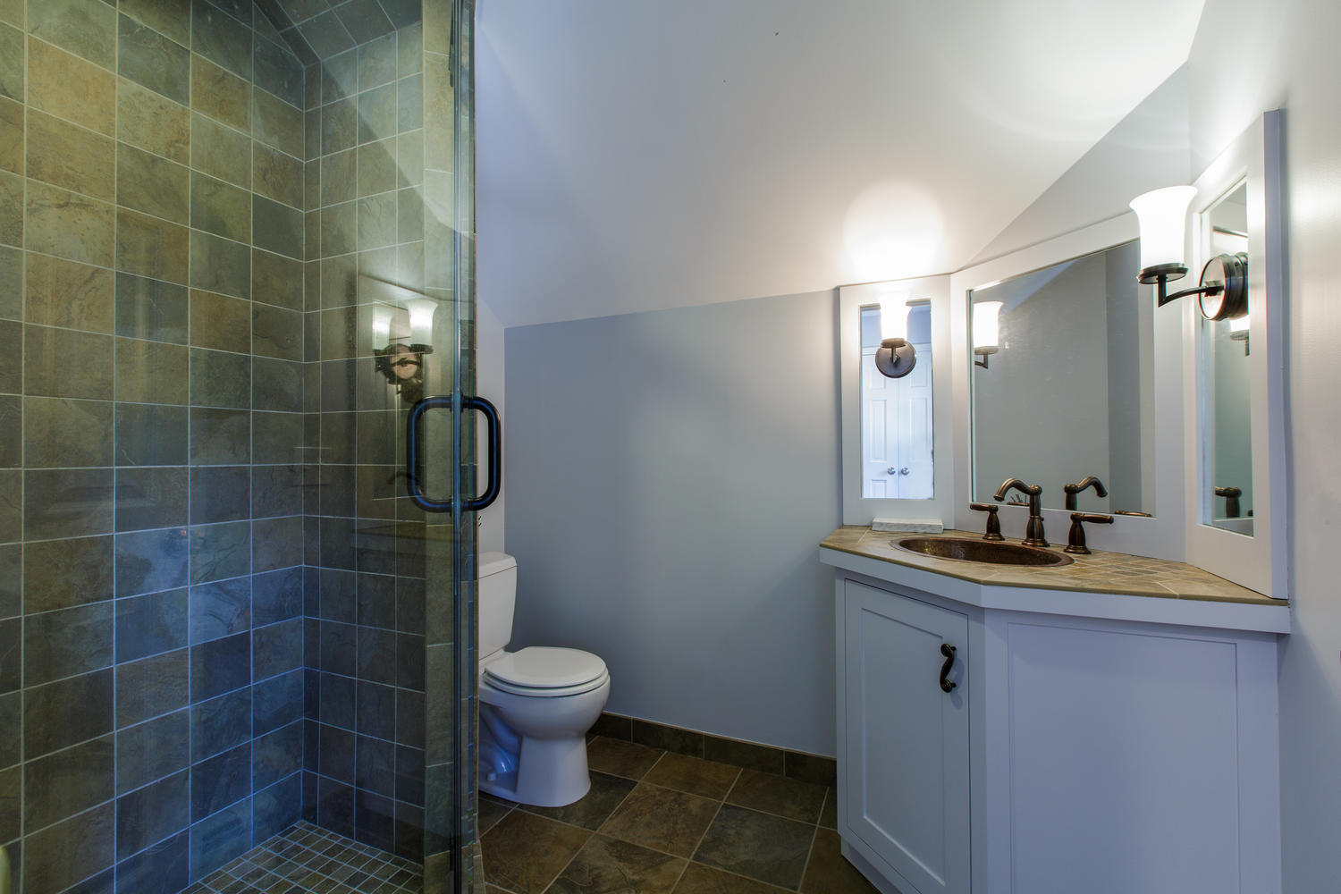 73 Talmadge Hill Road New Canaan, CT 06840 - Photo 17 of 37 a bathroom with a sink a toilet and shower