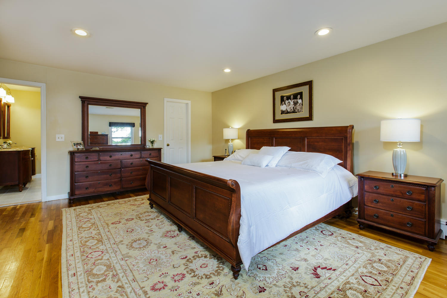 73 Talmadge Hill Road New Canaan, CT 06840 - Photo 20 of 37 a bedroom with a bed and a dresser