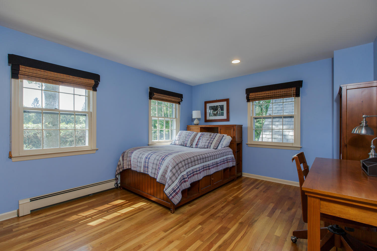 73 Talmadge Hill Road New Canaan, CT 06840 - Photo 21 of 37 a bedroom with a bed window and a flat screen tv