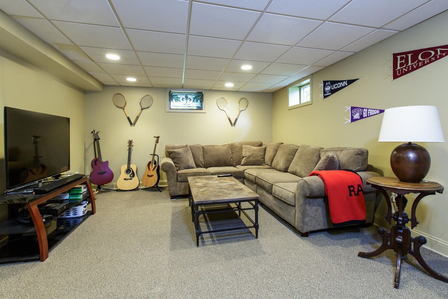73 Talmadge Hill Road New Canaan, CT 06840 - Photo 23 of 37 a living room with furniture and a flat screen tv