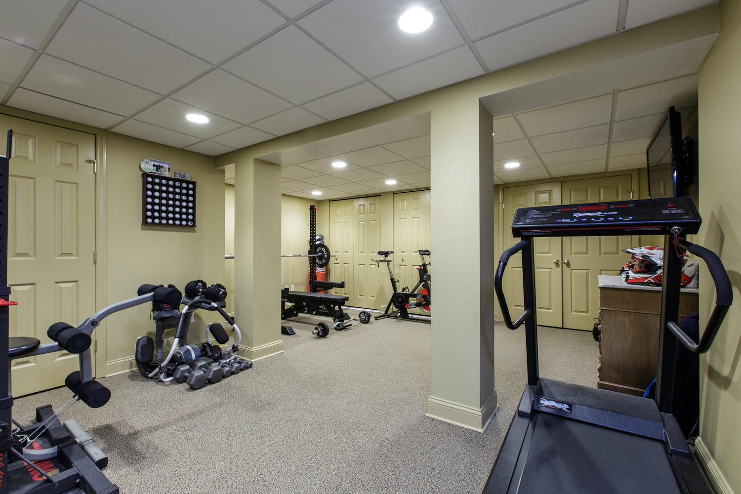 73 Talmadge Hill Road New Canaan, CT 06840 - Photo 24 of 37 a view of a room with gym equipment