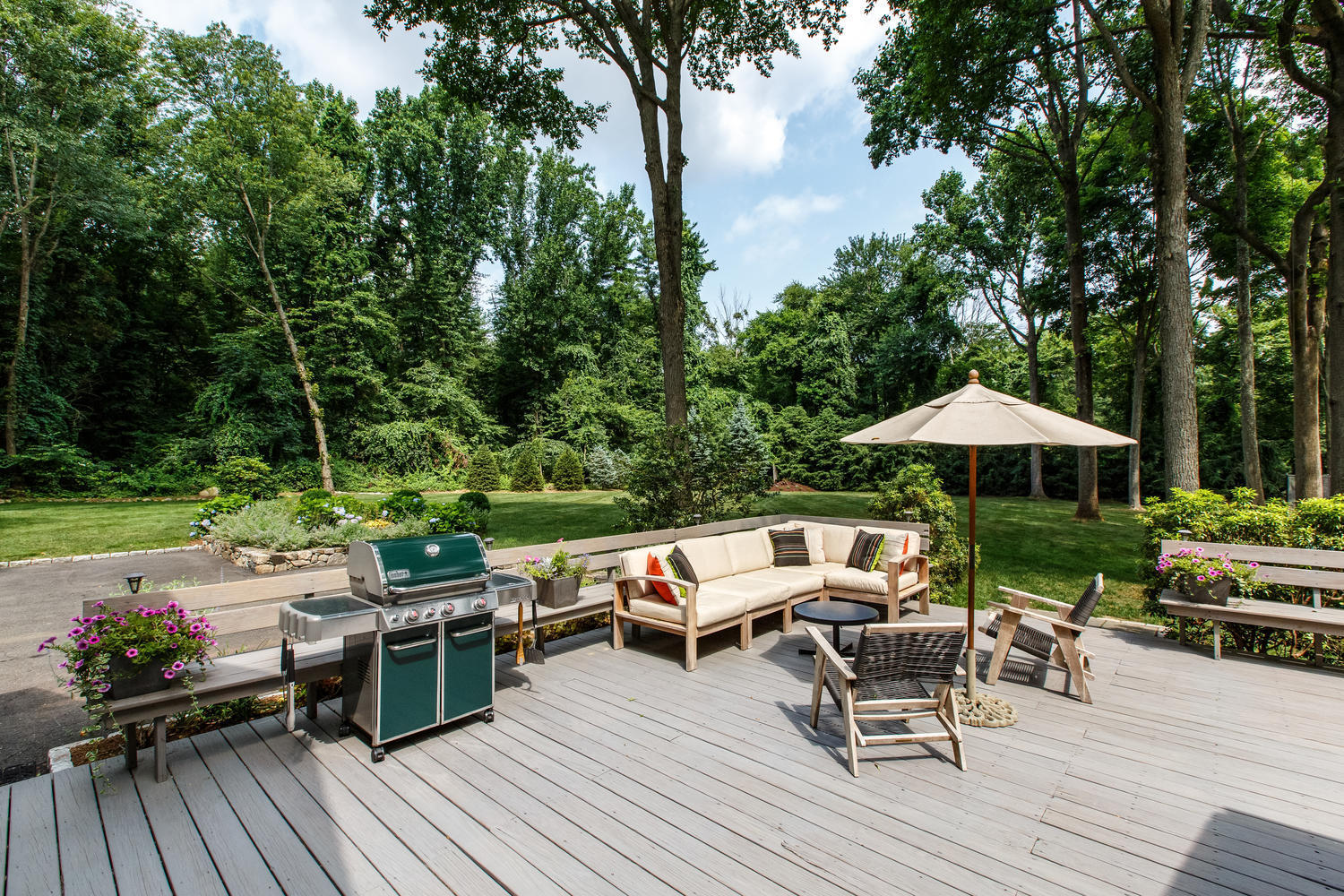 73 Talmadge Hill Road New Canaan, CT 06840 - Photo 25 of 37 a view of deck with chairs and wooden floor