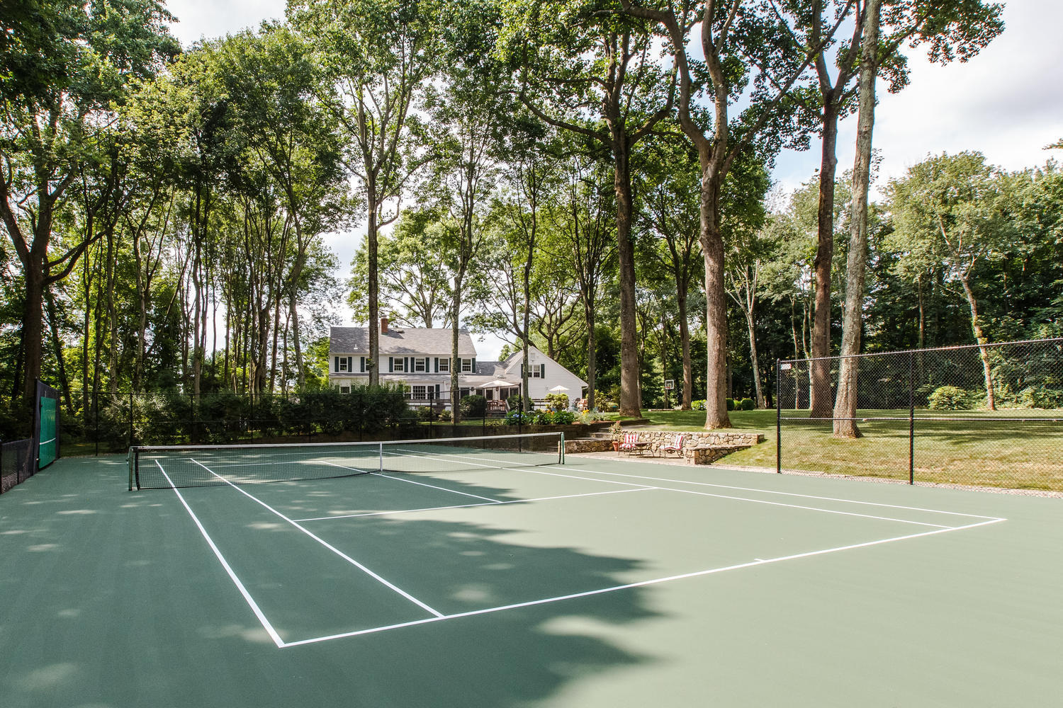 73 Talmadge Hill Road New Canaan, CT 06840 - Photo 30 of 37 a view of a tennis court