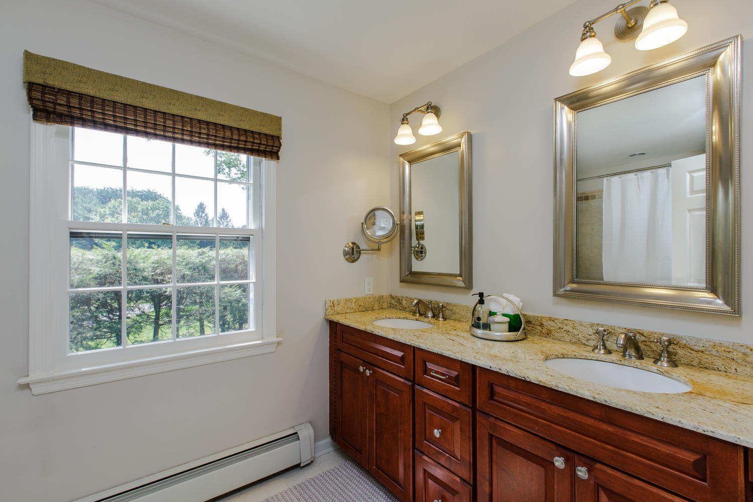 73 Talmadge Hill Road New Canaan, CT 06840 - Photo 31 of 37 a bathroom with a granite countertop sink and a large mirror