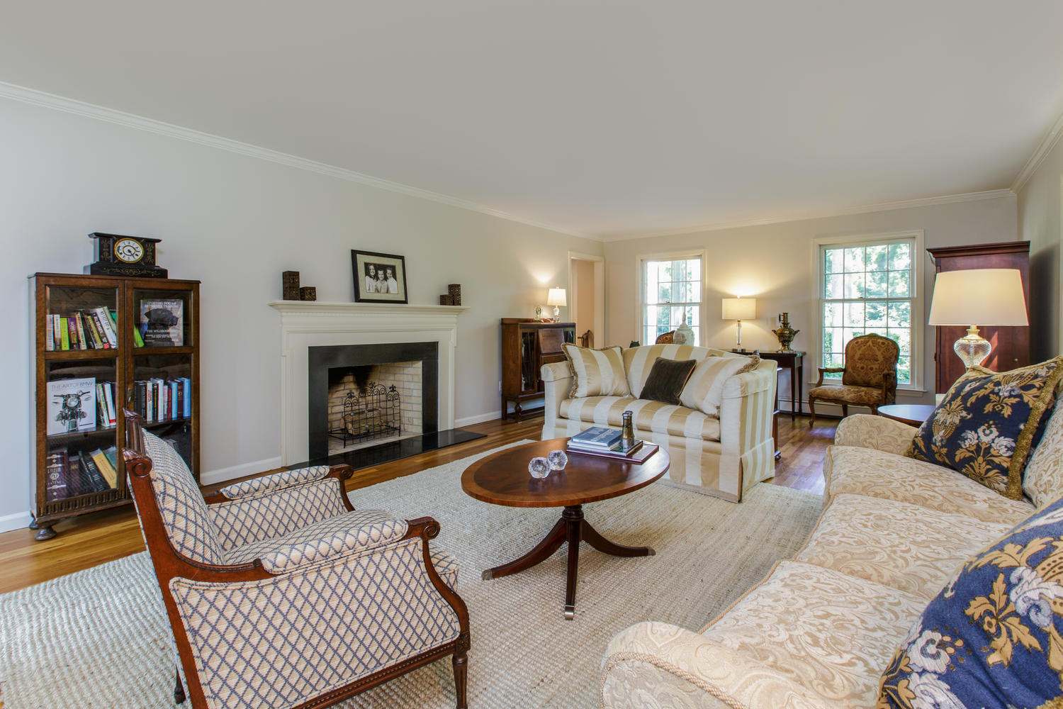 73 Talmadge Hill Road New Canaan, CT 06840 - Photo 32 of 37 a living room with furniture and a fireplace